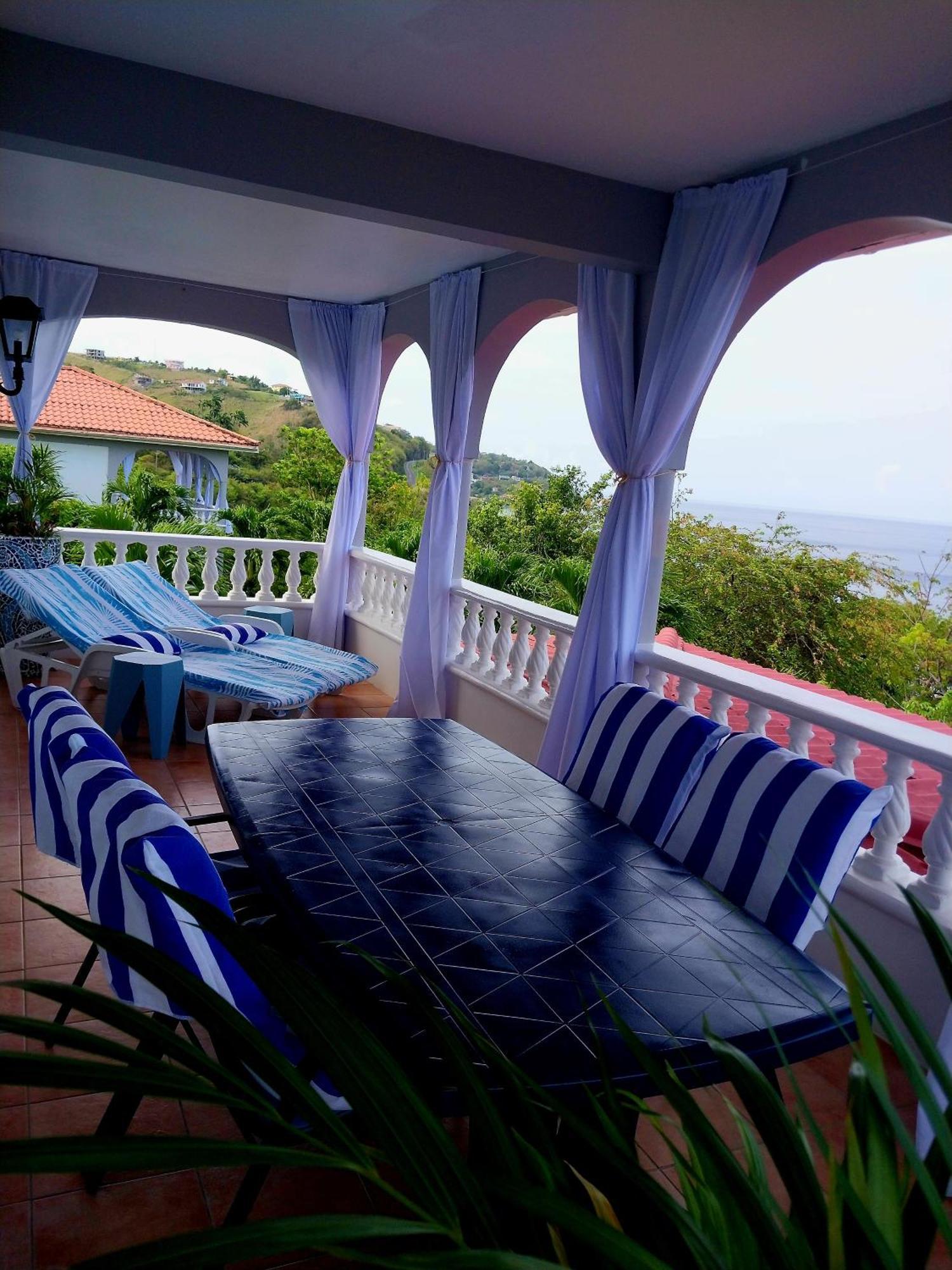 Caribbean Sea View Holiday Apartments Méro Exteriör bild